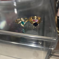 2 Rings One double ban a twenty four carat gold, sapphire, two rubies, ten carat gold diamonds, emeralds, bolt, solid gold