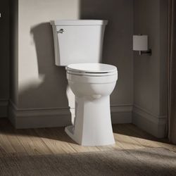 KOHLER Elliston Tall White Elongated Tall height 12-in Rough-In Water Sense 1.28 GPF Soft Close 2-piece...