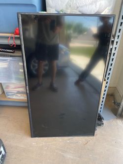 52 inch TV with a remote control