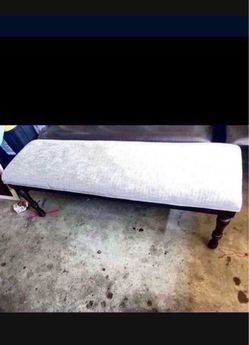 Bench Brand New  $130  54 wide 18 1/2 tall  fabric color gray  wood color brown .