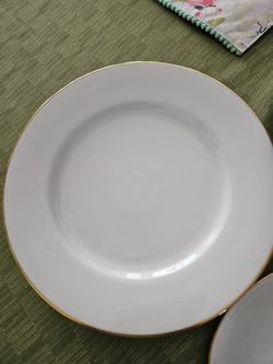 Dishes. PotteryBarn.  16 pc place setting. Glass-white with gold edge