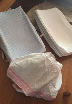 Changing pad and bed skirts
