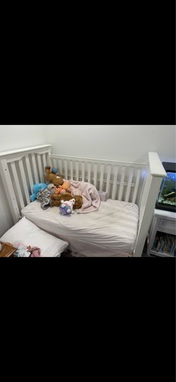 Pottery barn crib and toddler railing