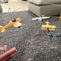 Restoration Hardware baby room plane mobile