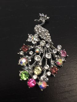 Peacock pin brooch collection