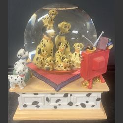 Disney 101 Dalmatians musical snow globe that plays the song "Cruella De Ville"