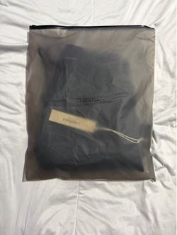 Black essentials fear of god shorts