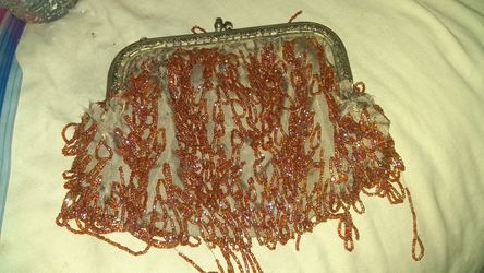 Vintage tattered fringe look purse