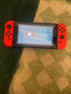 Barley used Nintendo Switch, fully factory reset, two red controllers, dock, case, and HDMI cable