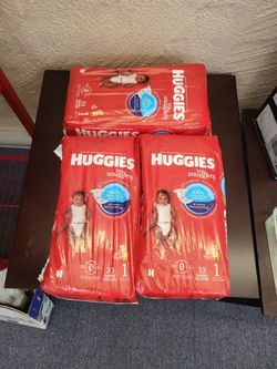 99 Huggies little snuggler size 1 diapers