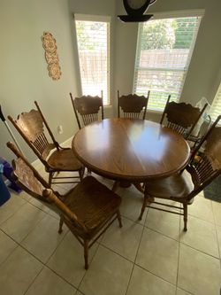 Oak Pedestal Dining Table with 6 Chairs and Leaf