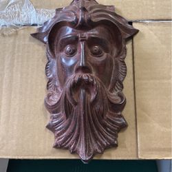 Cash iron bust of old man winter