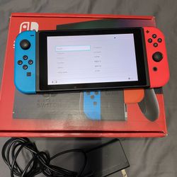 Nintendo Switch With Neon Blue And Neon Red Joy-Con 