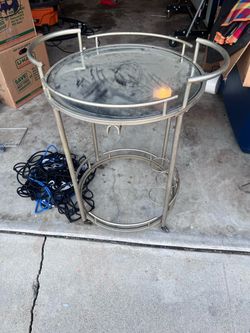 Round glass bar cart table