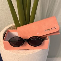 Black Oval Miu Miu Shades