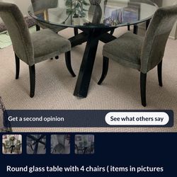 Round glass table with 4 cha...