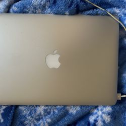 MacBook Computer With Logi Bluetooth Mouse 