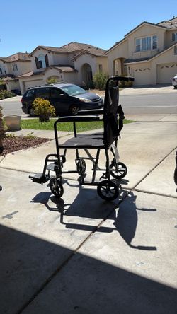Wheelchair walker, excellent condition super light, easy to fold and curry