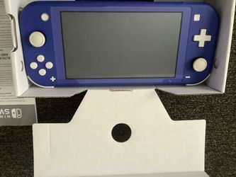 PRISTINE NINTENDO SWITCH LITE AND ZELDA GAME INCLUDED