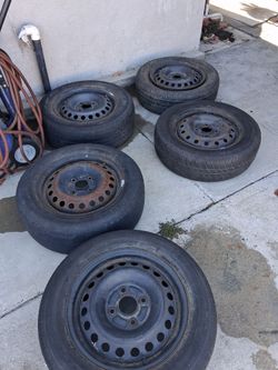 5 Honda rim and tires$50