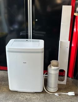 Like new AUX air conditioner 3 in 1 cooling fan dehumidifier
