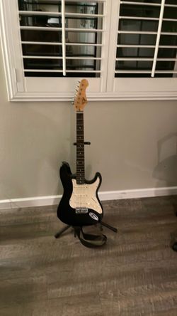 Black electric guitar