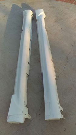 08 G37s side skirts oem