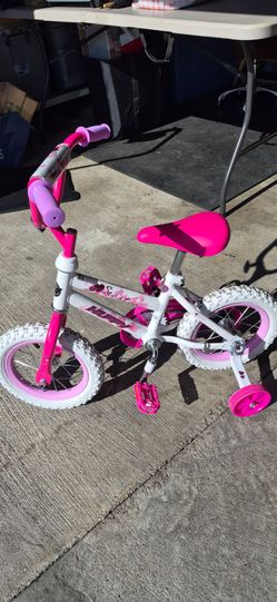 Girls 12" Huffy bicycle w/ training wheels
