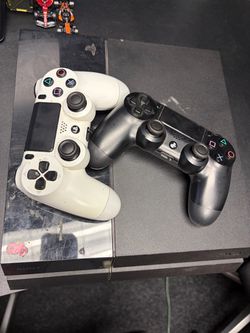 PS4 Console with Two Controllers