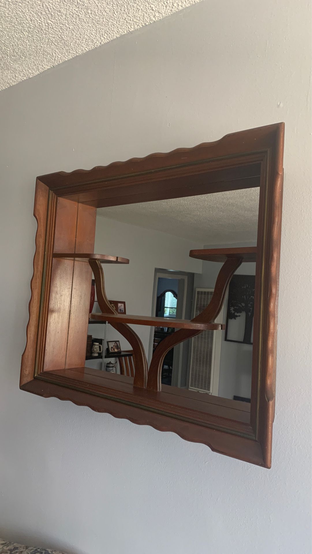 Antique mirror with decorative shelves $5