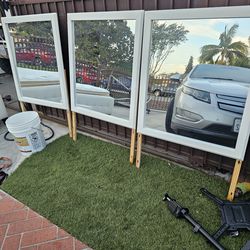 Mirrors in white wood frame