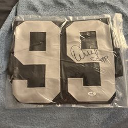 AUTOGRAPHED WARREN SAPP RAIDERS JERSEY
