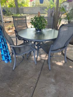 Patio set & Glider Tropitone