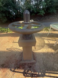 I thought vintage railroad handbrake wheel mounted on custom wooden display pedestal