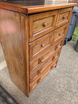 All wood dresser with faux leather top