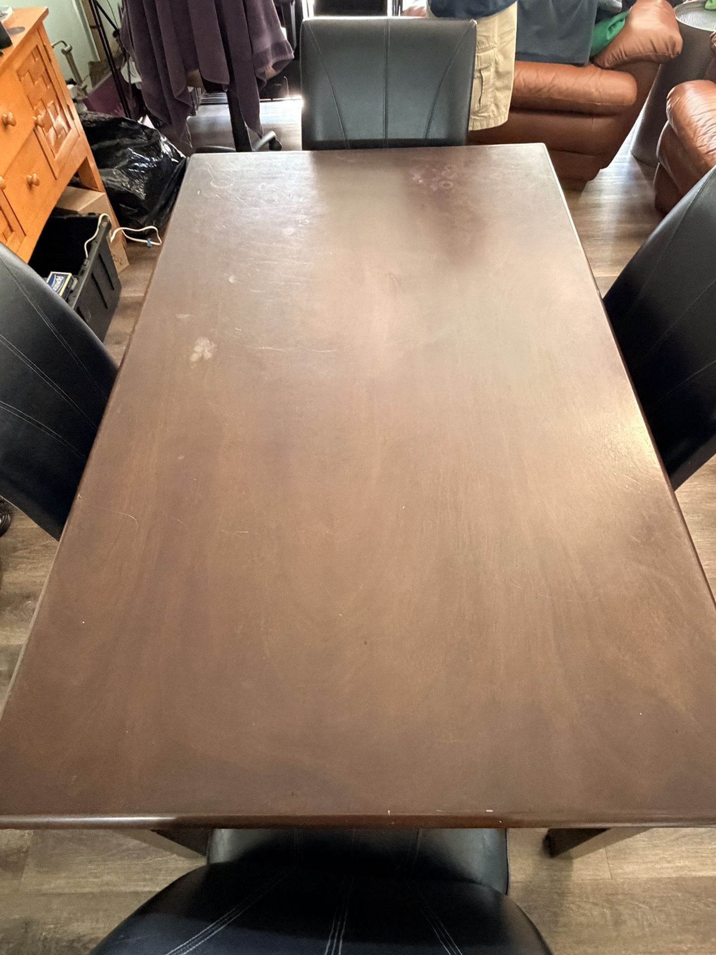 Brown dinning room table + 4 black chairs - Estate Sale