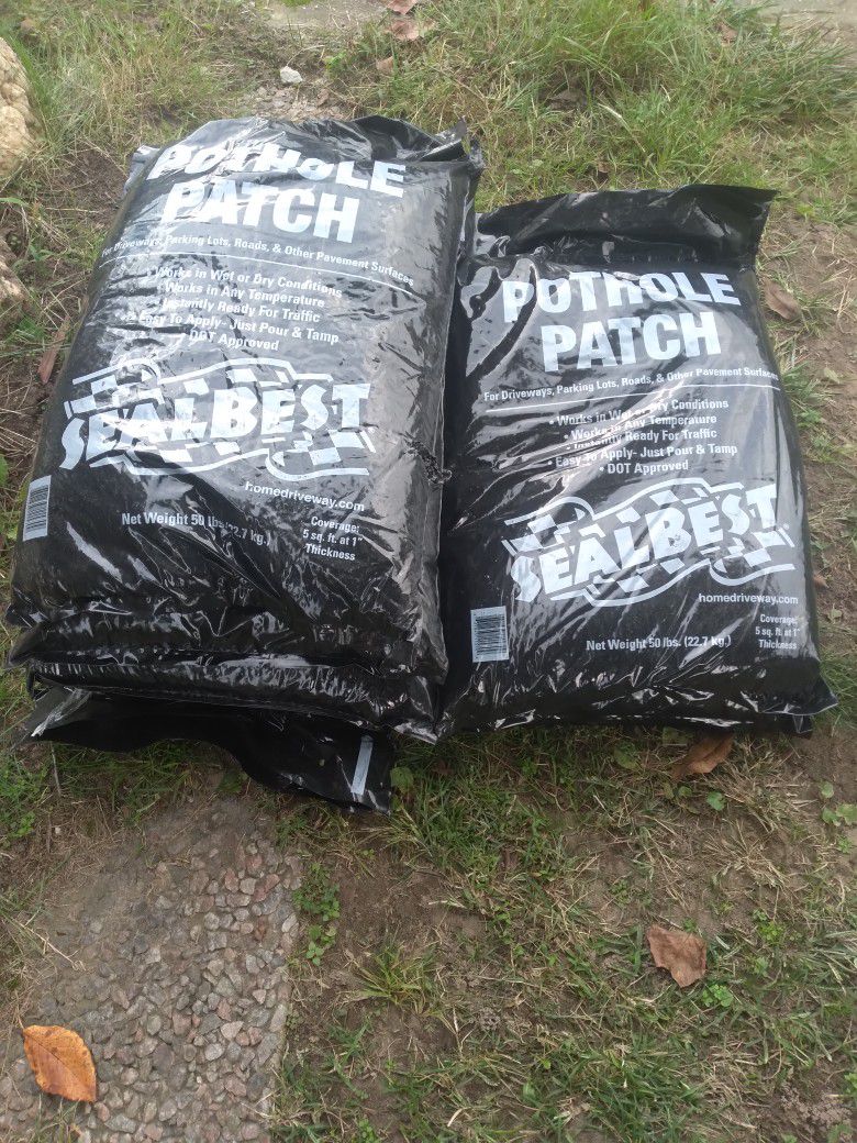 6 Bags Of Seal Fast Asphalt Patch