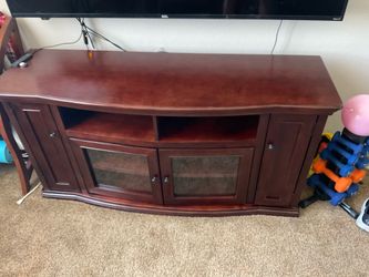 Mahogany color entertainment center and tv stand in great shape DIMENSIONS IN PHOTOS