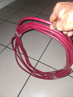 Red Extension Cord It's About 25 Feet Long Firm Price $25