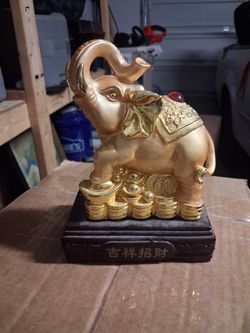 Small gold resin statue