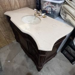 Sink with the wood cabinet