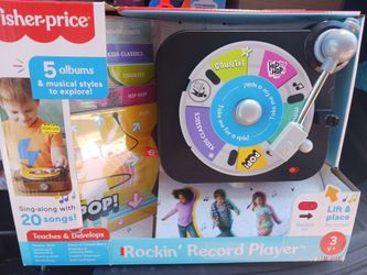 FISHER PRICE ROCKIN RECORD PLAYER