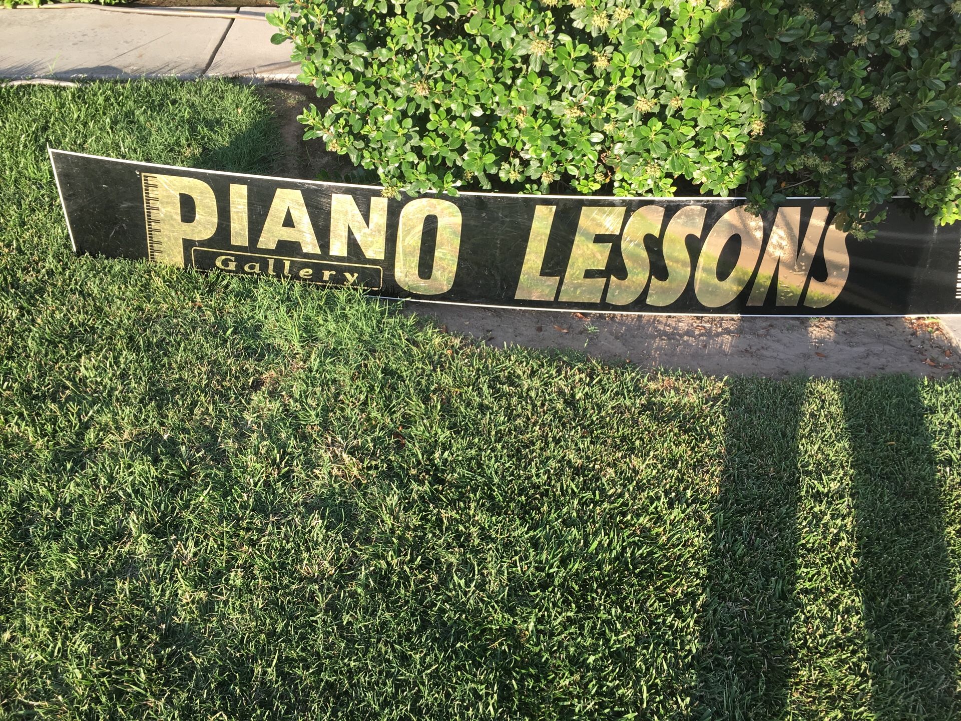 Large top 10 foot long piano lesson sign