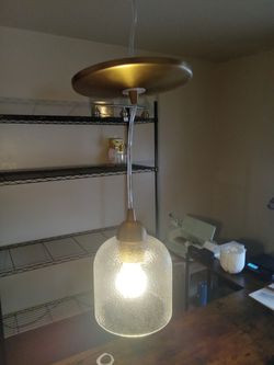 Satin brass recessed lighting adaptor with clear hammered glass