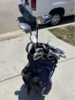 Golf Clubs with Taylor made golf bag