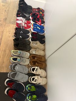 16 pairs of boys shoes