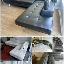 MODERN LEATHER SECTIONAL WITH CUP HOLDERS AND ADJUSTABLE HEADRESTS $575!! BRAND NEW IN BOXES!!  Available in black , white and gray !!  9ft by 7 ft 