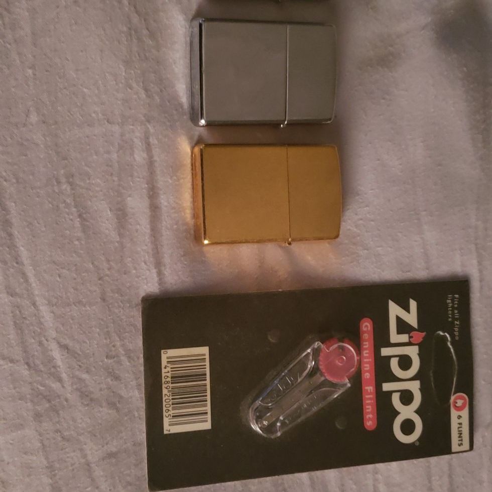 Zippo Lighters with Brand New Flints.