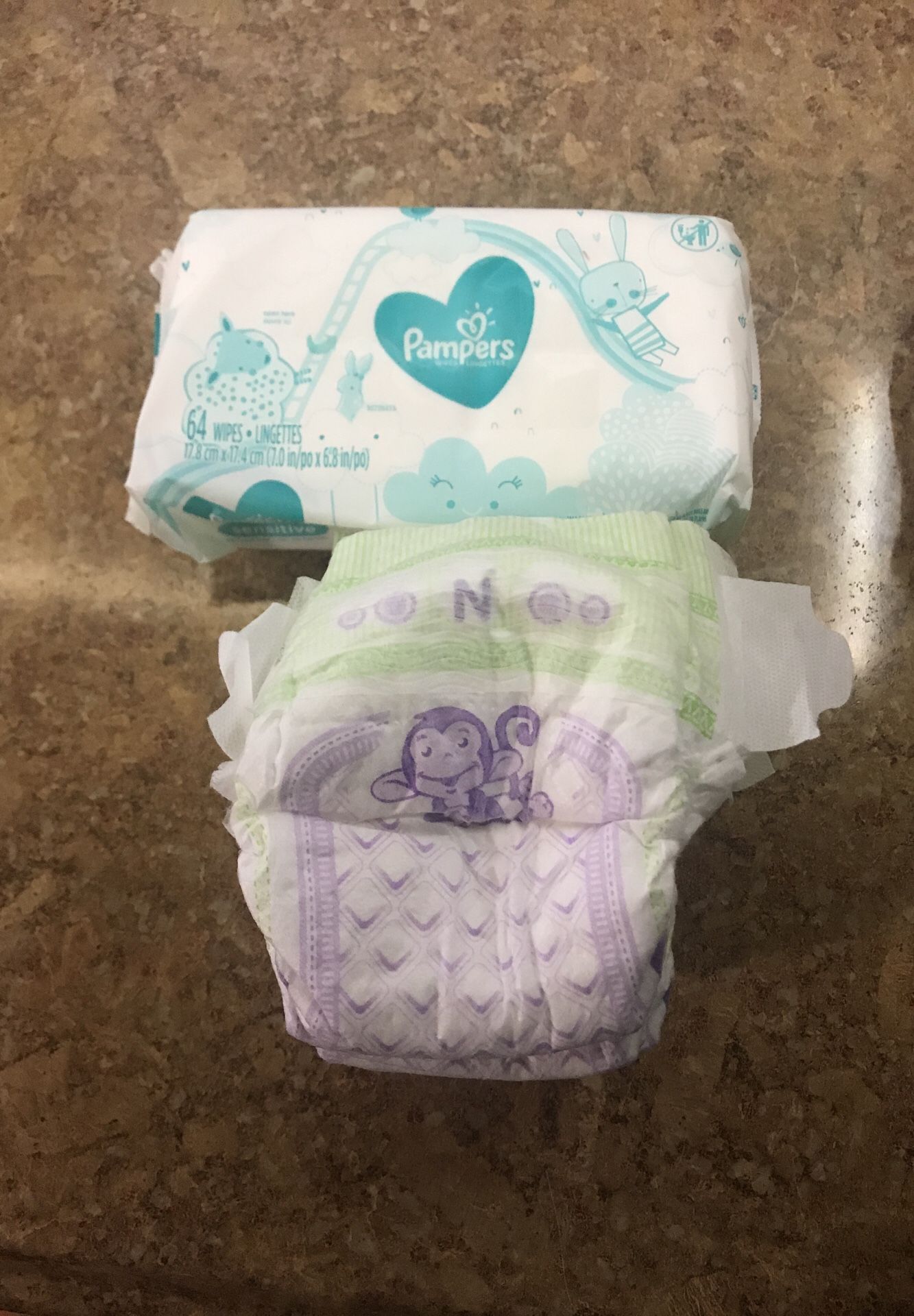 Sensitive pampers wipes an newborn luvs diapers