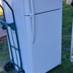 Refrigerator and freezer. By Frigidaire New condition.
